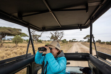 woman tourist posing during safari in africa © константин константи