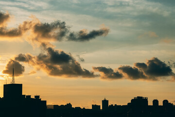 Fototapeta na wymiar Silhouette of city buildings at dusk