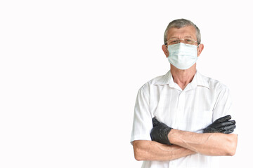 An elderly man in a medical mask on a white background