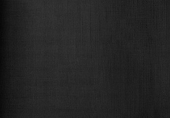 close up detail of black fabric texture background. abstract fabric texture background. texture of mesh or silk fabric for dark black concept background.