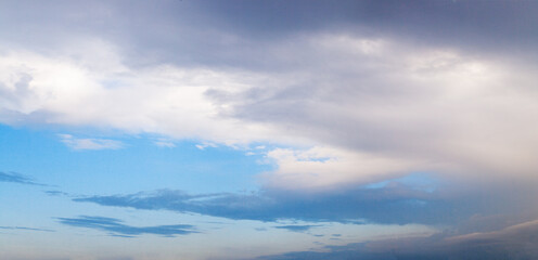 Naklejka na ściany i meble Blue sky background and white clouds, pastel sky background