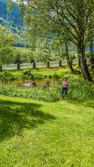 Lady walking in the park, Rjukan Norway