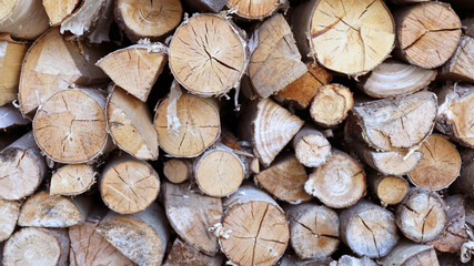 Firewood chopped and stacked, firewood background