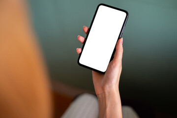 woman using mobile phone with blank white screen