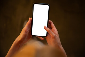 woman using mobile phone with blank white screen