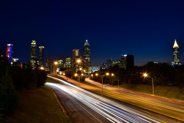 Fototapeta na wymiar Night traffic in Downtown Atlanta during the July 4th Holiday Weekend