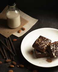 chocolate brownies on dark and white background homemade bakery and dessert white marble top view flat lay looking down with text space copy space