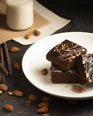 chocolate brownies on dark and white background homemade bakery and dessert white marble top view flat lay looking down with text space copy space