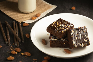 chocolate brownies on dark and white background homemade bakery and dessert white marble top view flat lay looking down with text space copy space
