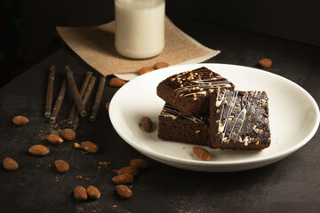 chocolate brownies on dark and white background homemade bakery and dessert white marble top view flat lay looking down with text space copy space