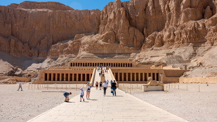 Tourists in front of the Deir al-Bahari Complex and the temple of Hatshepsut, Luxor, Egypt, April...