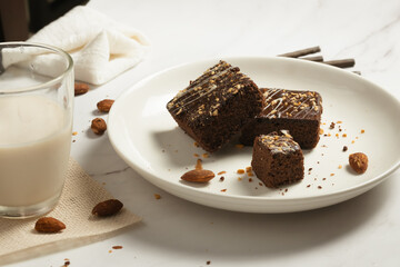 chocolate brownies on dark and white background homemade bakery and dessert white marble top view flat lay looking down with text space copy space