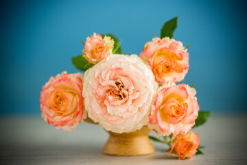 bouquet of beautiful orange roses on table