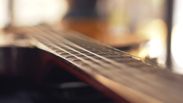 Close-up of a guitar lying next to the stage before the start of the concert