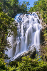 Khlong Lan Waterfall, large and exotic waterfall in tropical forest in National Park, Kamphaeng Phet, Thailand