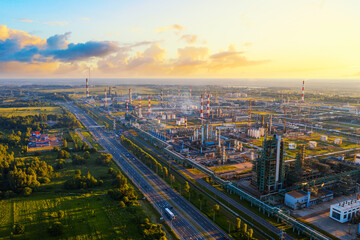 Obraz premium Aerial drone view of petrol industrial zone or oil refinery in Yaroslavl, Russia during sunset time