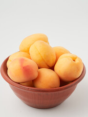 Apricot isolate. Apricots with slice on white. Fresh apricots. With clipping path. Full depth of field.