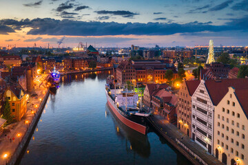 Amazing architecture of the main city in Gdansk at sunset, Poland. Aerial view of Granaries Island at the Motlawa river