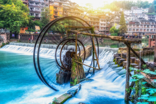 Waterwheel by the river in Fenghuang Ancient Town