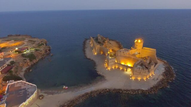 Aragonese Fortress, touristic aragonese castle "Le Castella". Night landscape of the Calabria region, southern Italy