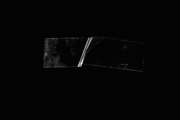 adhesive transparent tape on black background. abstract crumpled sticky tape for poster design...