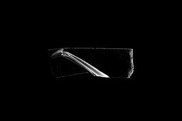 adhesive transparent tape on black background. abstract crumpled sticky tape for poster design...