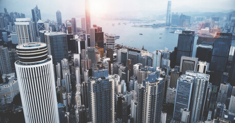 AERIAL. Cinematic blue style footage of Hong Kong city center at day time.