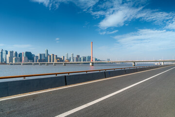 Road and Hangzhou modern city buildings skyline