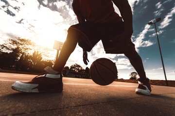 Basketball street player dribbling with ball on the court - Streetball, training and activity...