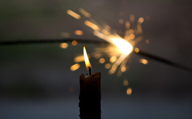 burning candle in the dark