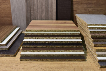 Samples of fibreboard panels with wood texture. Laminated CPD. Chipboard PVC edge. Wooden furniture...