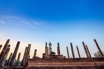 Fototapeta na wymiar Pagoda Buddha statue at Sukhothai historical park