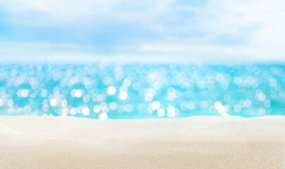 Fototapeta na wymiar Seascape and sandy beach. Defocused sea water surface glittering on the sun.
