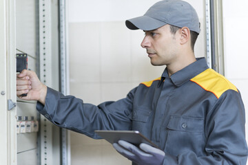 Portrait of an electrician at work