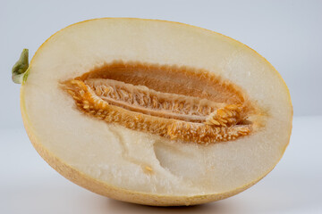 fresh ripe melon isolated on white background, yellow cantaloupe melon isolated on white background