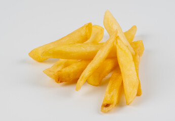 French fries or fried potatoes isolated on white background with clipping path and full depth of...
