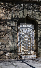 an old fountain in the courtyard wall of the Vorontsov Castle of the Crimean Peninsula in spring