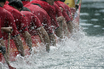 action of dragon boat racing