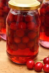 Cherry compote, sour cherries compote, jar of fruit.