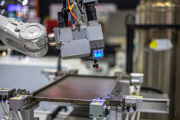 robot arm working in factory