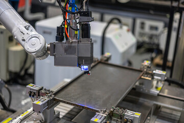 robot arm working in factory