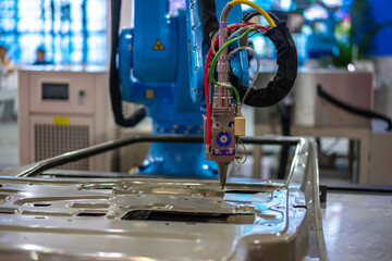 robot arm working in factory