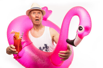 The man poses in a photo studio.