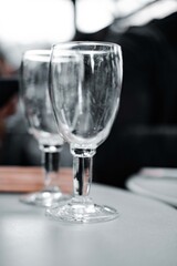 Paris, France 04-07-2021: two slightly dirty glasses of a restaurant at Champs Elysee