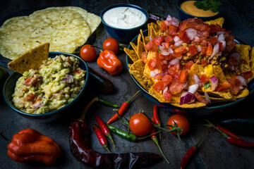 nachos guacamole mexian food and spicy pico de gallo