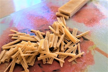Preparing process of homemade Turkish noodle, selective focus. Noodles are the pasta that Turkish women make. It is called 