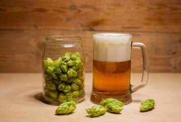 Mug of light beer with hops