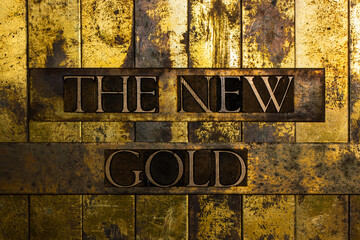 The New Gold text on textured grunge copper and vintage gold background