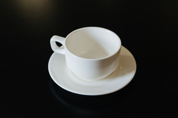 white porcelain cup and saucer for tea or coffee
