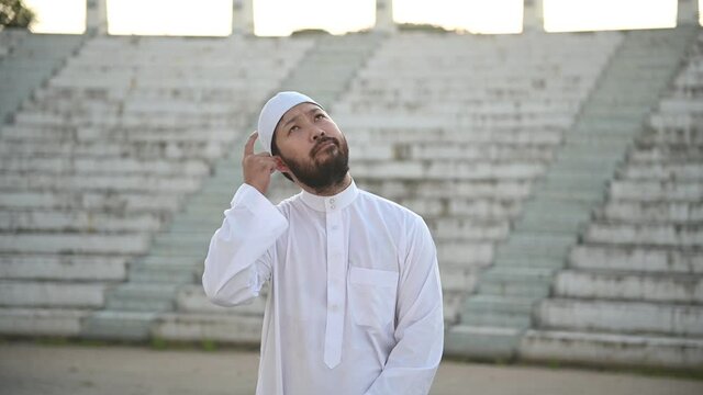Asian white islam man prayer,Young Muslim praying,Ramadan festival concept